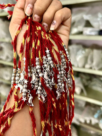 Traditional Mauli Kalawa Rakhi with Charms – Red & Yellow Thread