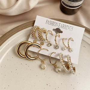 AVR JEWELS Combo Of 9 Stunning Gold Plated Pearl Studs and Hoop Earrings